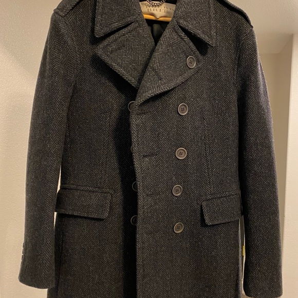 Like new Burberry full length trench coat.